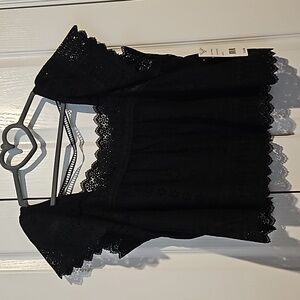 Black eyelet crop top